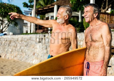 Seniors friends on the beach