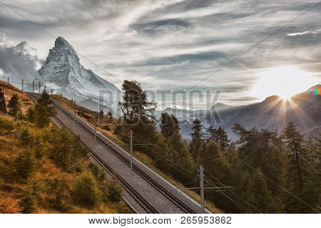 Matterhorn Peak With Railway Against Sunset In Swiss Alps, Switzerland