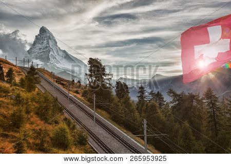 Matterhorn Peak With Railway Against Sunset In Swiss Alps, Switzerland