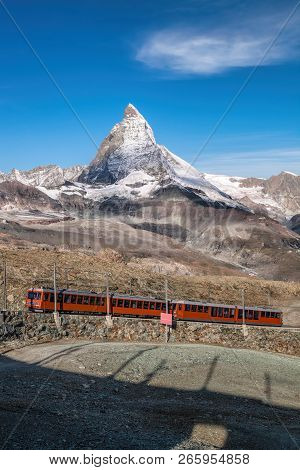 Famous Matterhorn Peak With Gornergrat Train In Zermatt Area, Switzerland