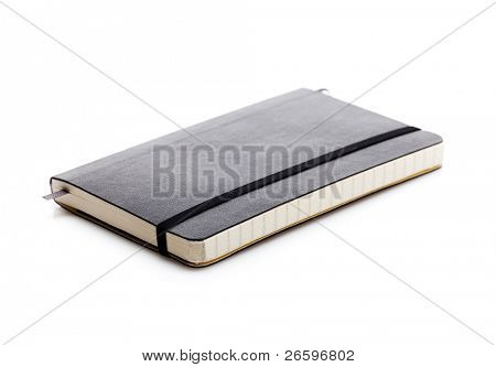Black moleskine isolated over white.