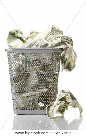 Geld im Korb. isolated over White.
