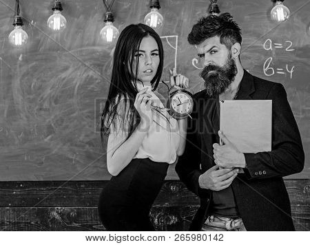 School Rules Concept. Lady Teacher And Strict Schoolmaster Care About Discipline And Rules In School