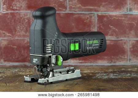 Moscow, Russia, August 15, 2018. Electric Jig Saw Festool Trion Ps 300 Eq On A Wooden Table Against 