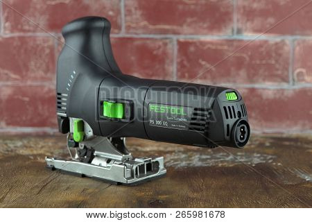 Moscow, Russia, August 15, 2018. Electric Jig Saw Festool Trion Ps 300 Eq On A Wooden Table Against 