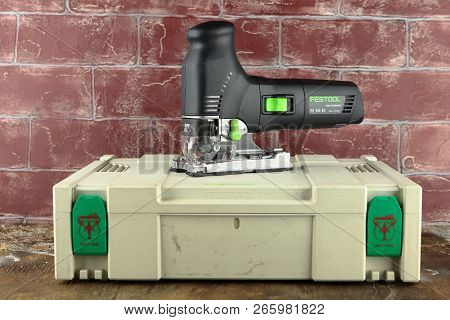 Moscow, Russia, August 15, 2018. Electric Jig Saw Festool Trion Ps 300 Eq On A Wooden Table Against 
