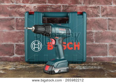 Moscow, Russia, August 18, 2018. 18v Lithium-ion Cordless Drill-drivers Bosch Gsr 1800-li On A Woode