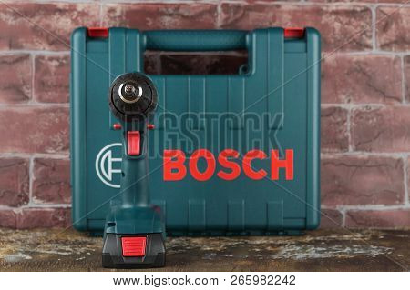 Moscow, Russia, August 18, 2018. 18v Lithium-ion Cordless Drill-drivers Bosch Gsr 1800-li On A Woode
