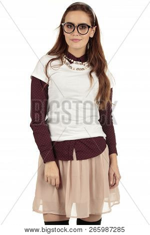 Day Dreaming Preppy Girl Look Into The Distance With A Pink Skirt And White T-shirt