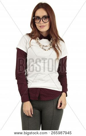 Cute Smiling Preppy, Fashion Geek Girl In A White T-shirt And Maroon Blouse