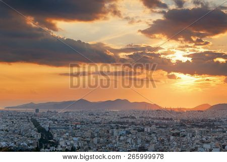 Athens skyline sunset viewed from Mt Lykavitos with Acropolis, Greece.