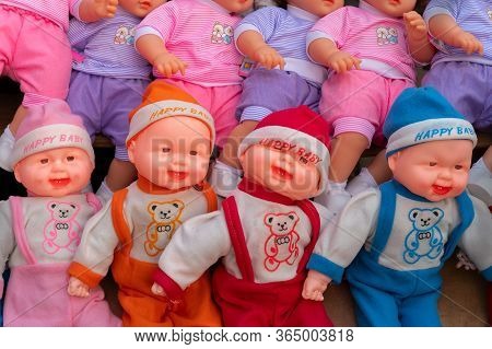 Colourful And Happy Tiny Baby Dolls For Sale At Retail Shop At Christmas Market, New Market Area, Ko