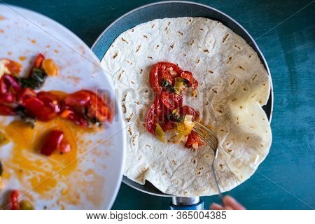 Cooking Pita Rolls Stuffed With Vegetables. Stuffing For Tacos. Eastern Cuisine. Pita Bread In A Pan
