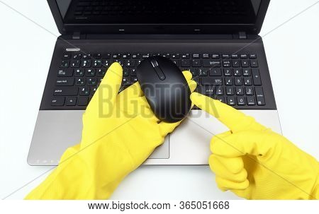 Disinfection In Public Places, The Fight Against The Virus, Coronavirus. A Rubber-gloved Working Han