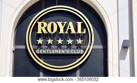 Warsaw, Poland. 7 May 2020. Sign Royal Gentelmen's Club. Company Signboard Royal Gentelmen's Club.