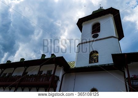 Tower From The Gate Entrance Of Agapia Monastery. Agapia Village, Neamt, Romania.