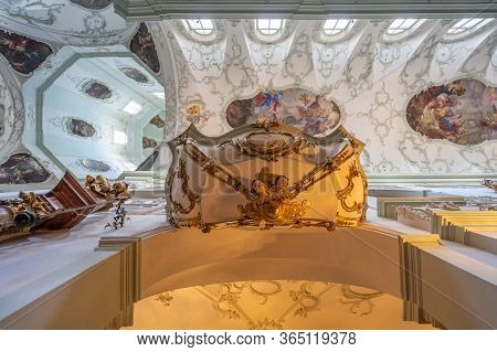 Feb 4, 2020 - Salzburg, Austria: Upward Ultrawide View Of Rococo Floral Mural Decorated Pulpit Insid