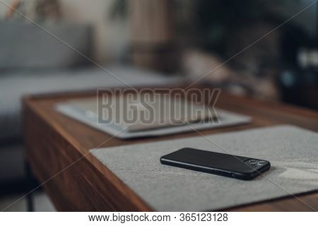 London,uk - May 5,2020: Iphone 11 Pro Max By Apple On A Table At Home, Laptop On Background, Selecti