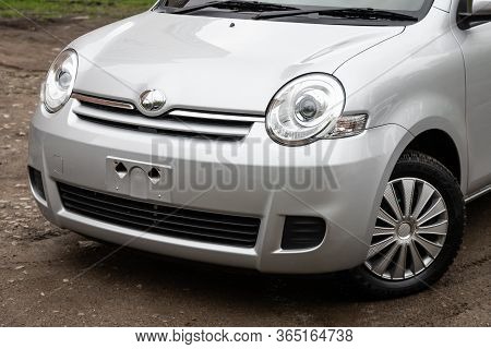 Novosibirsk/ Russia - May 02 2020: Toyota Sienta, Close-up Of The Headlight, Bumper, Wheel, Logo Rad