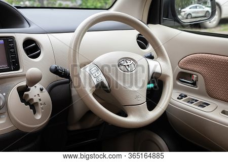 Novosibirsk/ Russia - May 02 2020: Toyota Sienta, Salon Of A New Stylish Car. Steering Wheel With Re