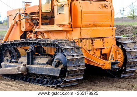 Industrial Building Construction Site Bulldozer Leveling And Moving Soil During Highway Building. Ye
