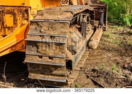 Industrial Building Construction Site Bulldozer Leveling And Moving Soil During Highway Building. Ye