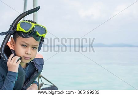 Portrait Asian Boy Wearing A Life Jacket And Scuba Diving Background Sea At Koh Talu , Prachuap Khir