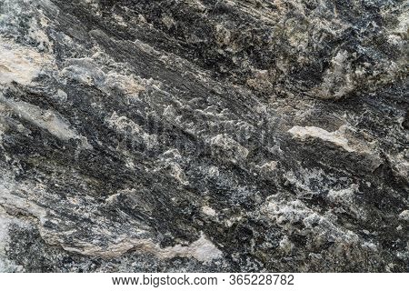 Gold Ore Texture Close-up. Contains Quartz, Mica, Feldspar, Chlorite, Garnet, Carbonate, Sulfides An