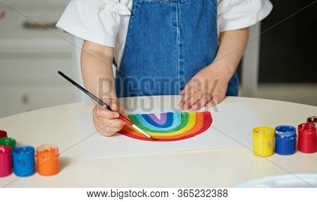Thank To Nhs. Kid Painting The Rainbow During Covid-19 Quarantine At Home. Coronavirus Covid-19 Outb