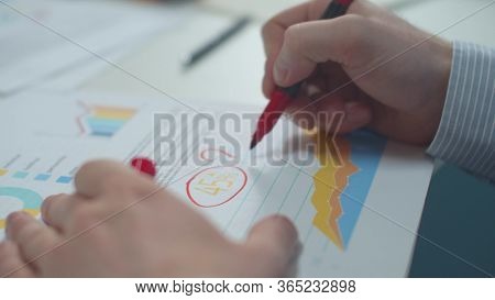 Office Worker Marks Errors In The Document