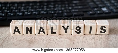Analisis - Concept Text On Wooden Cubes And In The Background Black Keyboard