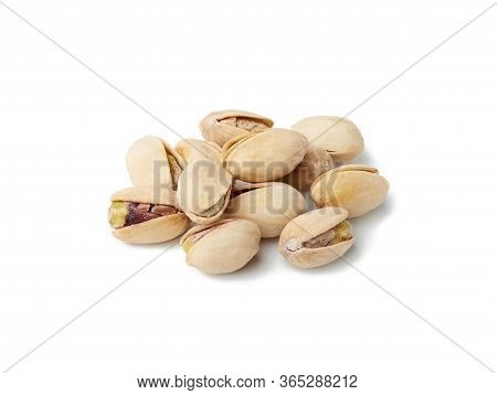 Bunch Of Salted Open Inshell Pistachios Isolated On A White Background, Tasty And Healthy Snack