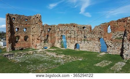 Aerial View Of The Ludza Medieval Castle Ruins On A Hill Between Big Ludza Lake And Small Ludza Lake
