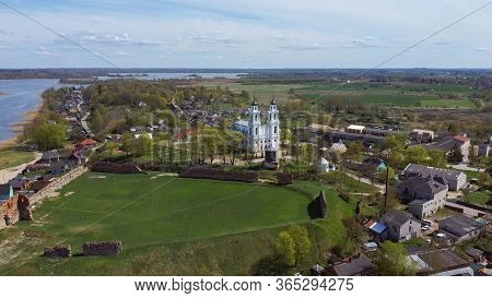 Aerial View Of The Roman Catholic Church In Ludza, Latvia. Sunny Spring Day