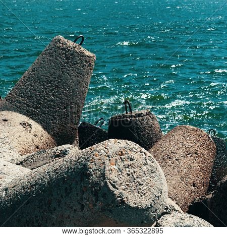 Concrete Barrage Prevents Waves In The Seaport.