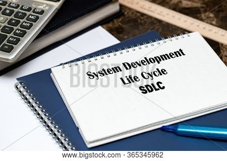 Sdlc - System Development Life Cycle, Acronym Business Concept. The Text Is Written On A White Sheet