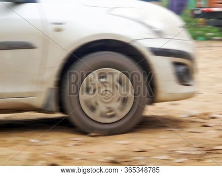 Side View Of Running Car In High Speed With Motion Blur