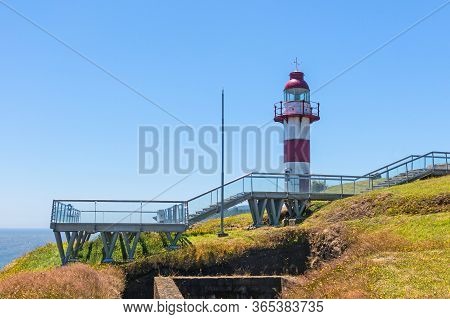 Lighthouse In Niebla, Valdivia, Chile. Lighthouse In The Spanish Fortress In Niebla, Valdivia, Patag