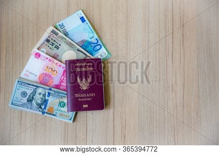 Banknote Many Currency, Yen-japan,dollar-usa,yuan-china, Euro-eu With Passport Book.image For Backgr