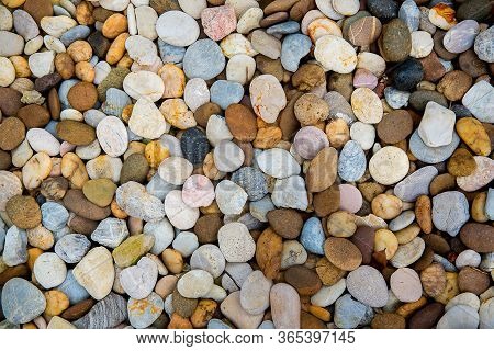 Sea Pebbles. Small Stones Gravel Texture Background.pile Of Pebbles, Thailand.color Stone In Backgro