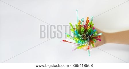 Seven Straws Of Bright Rainbow Colors Isolated On A White Background. They Lie In A Row. Greeting Ca