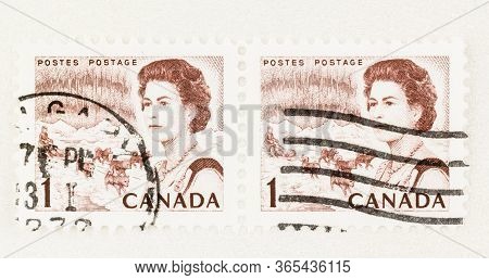Seattle Washington - May 8, 2020: Engraved 1967 Queen Elizabeth Definitive Stamp Featuring Dogs And 