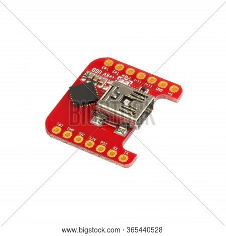 Red Universal Usb To Ttl Pcb Board Surface Mount Components In A Close-up Side View