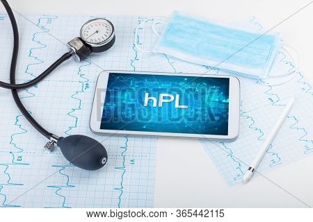 Close-up view of a tablet pc with hPL abbreviation, medical concept