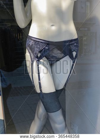 Cagliari, Italy - Circa October 2019: Yamamay Suspender Belt And Black Stockings Worn By A Mannequin