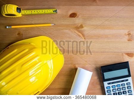 Designer Hat, Pencil, Tape Measure, Blueprint, Calculator, Wood Table Top, Top View, Copy Space