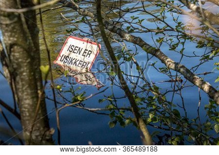 The Ice Is Unsafe, The Sign That The Ice Is Unsafe Is Out In The Water.