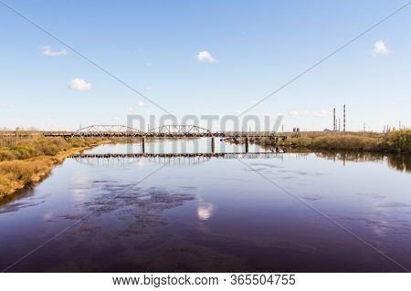 Railway Bridge Over The River.
Spring View Of The Province On A Sunny Day.