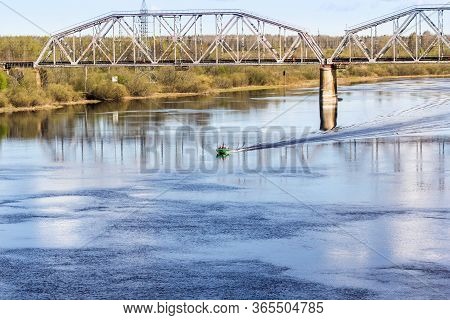 Boat Walking On The River.
Spring View Of The Province On A Sunny Day.