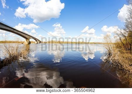 Clouds Over A Wide River.
Spring View Of The Province On A Sunny Day.
